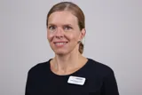 Fysioterapeut, Lone Larsen, fra Ulykkespatientforeningen smiler